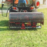 Mechanical aerator used to reduce soil compaction